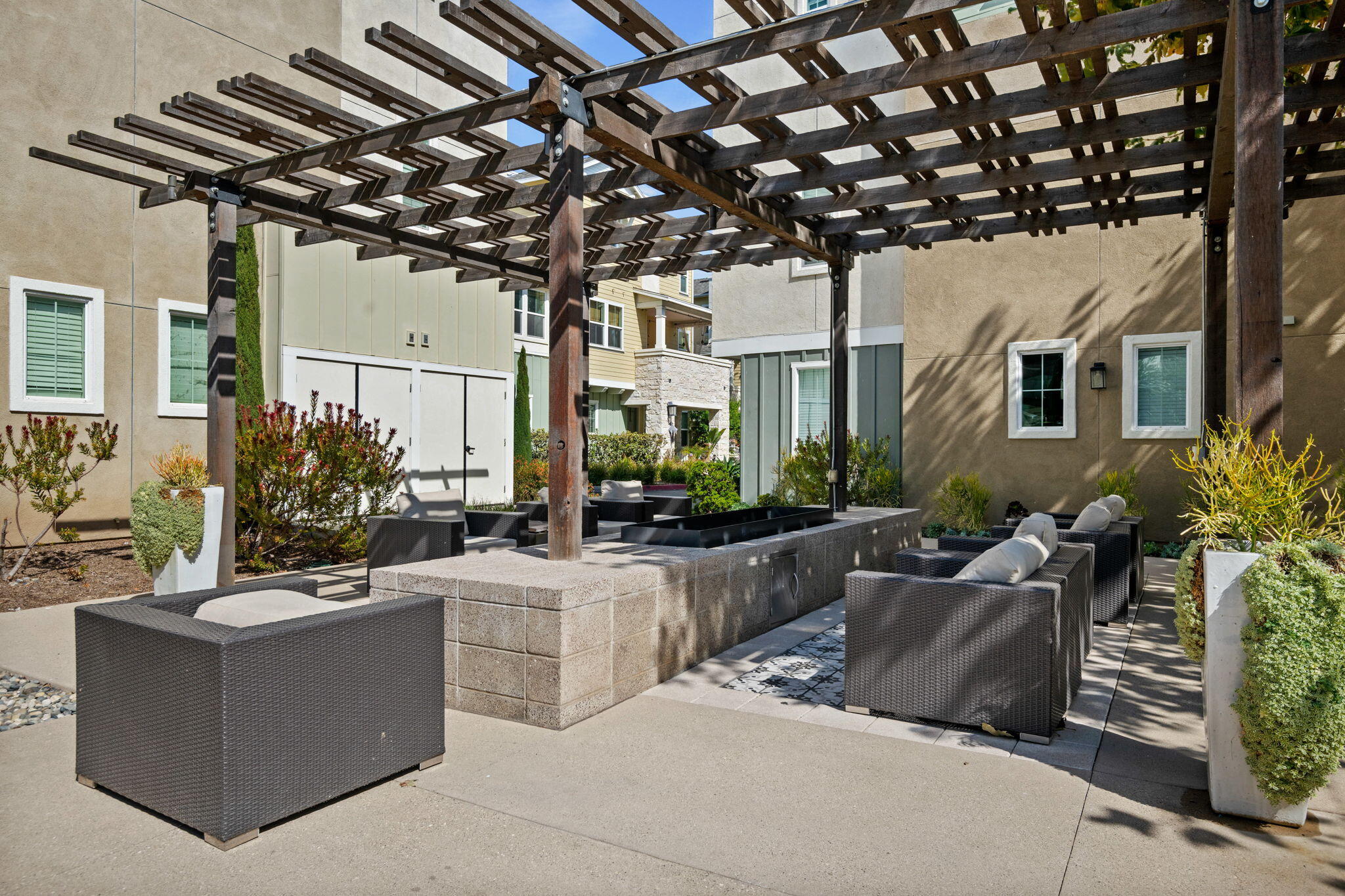 507 Bolinas Way, Unit 103 Goleta, CA 93117 - Photo 25 of 28 a view of a patio with couches and potted plants