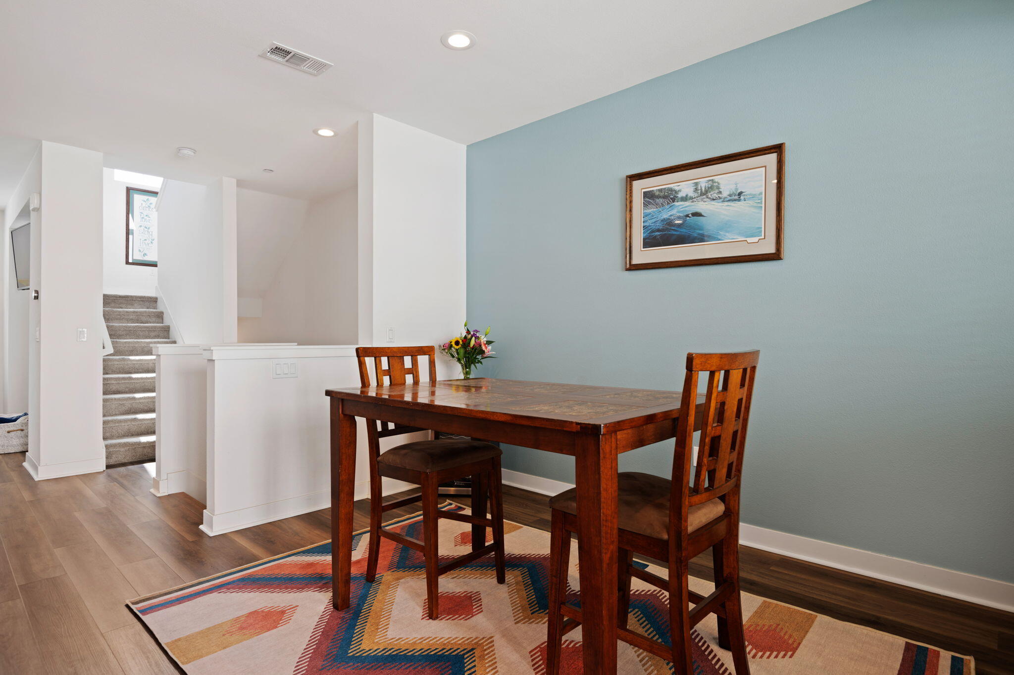 507 Bolinas Way, Unit 103 Goleta, CA 93117 - Photo 8 of 28 a view of a dining room with furniture and wooden floor