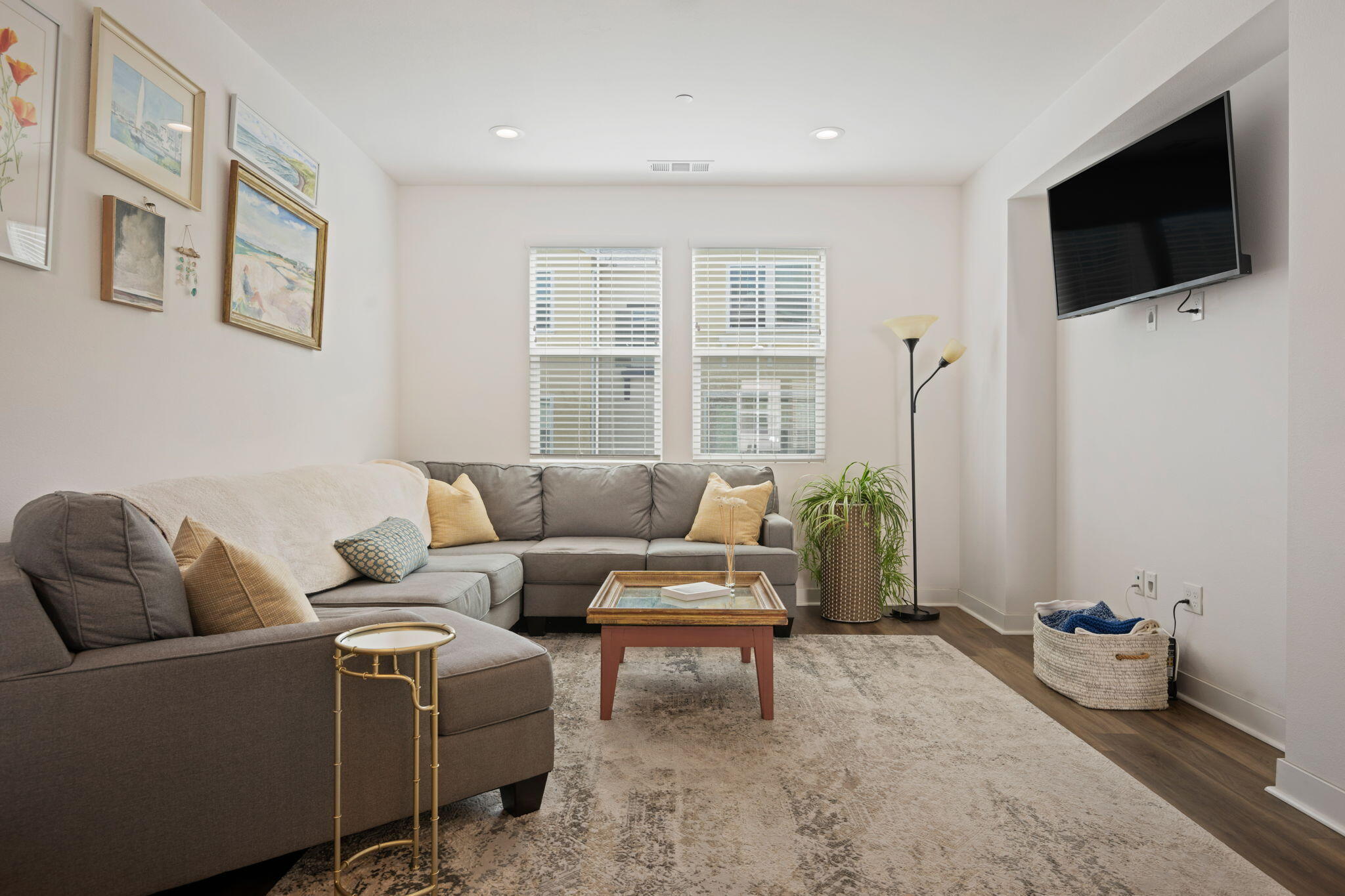 507 Bolinas Way, Unit 103 Goleta, CA 93117 - Photo 10 of 28 a living room with furniture and a flat screen tv