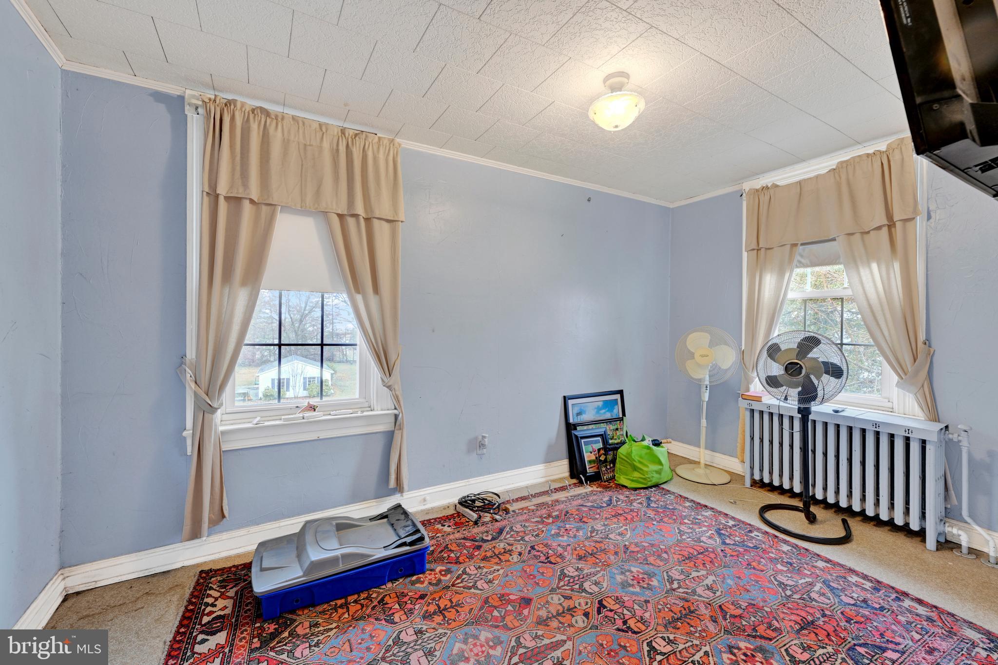 6500 Old Harford Road Baltimore, MD 21214 - Photo 19 of 28 a bed room with a bed and a window
