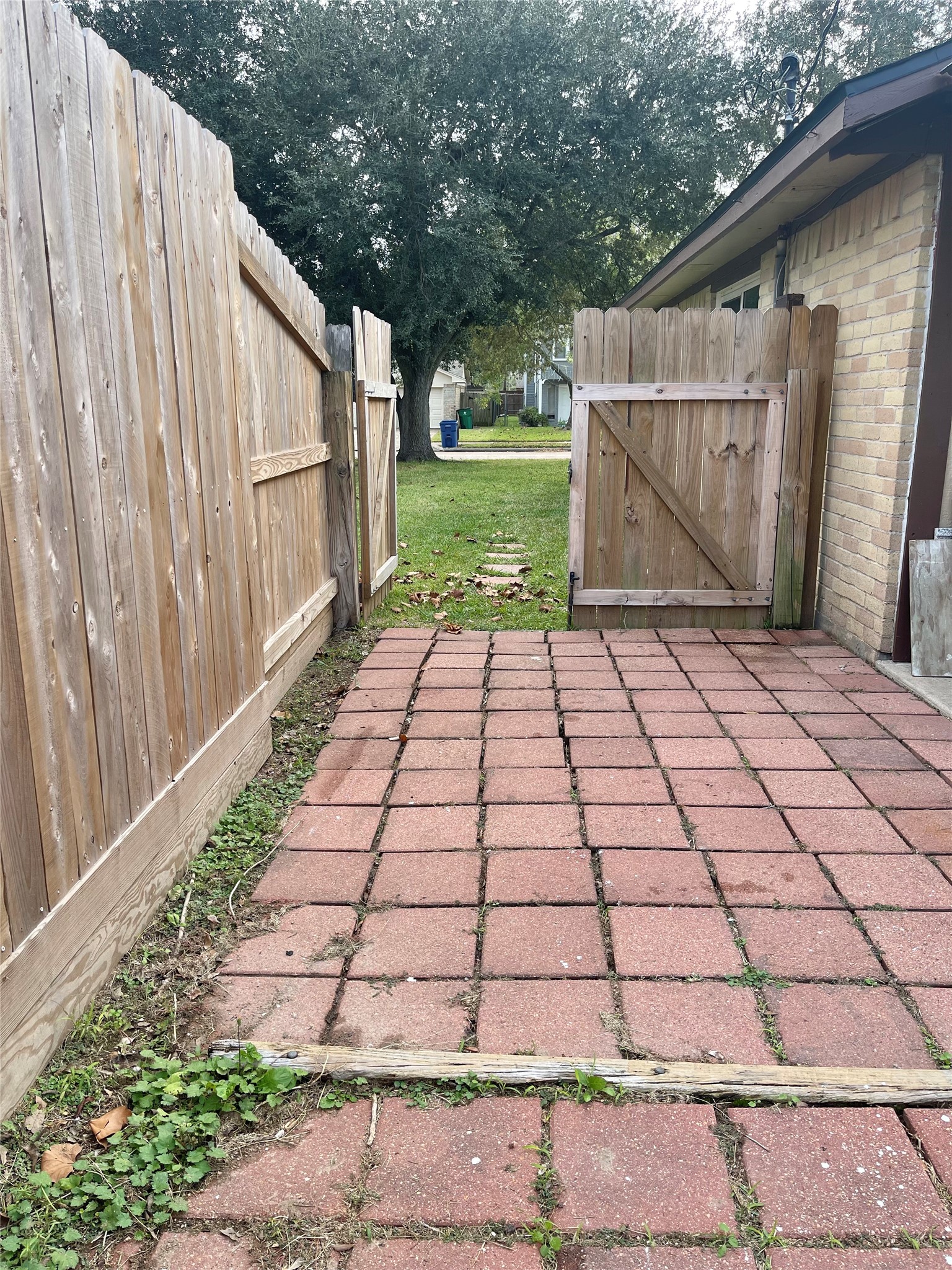 1225 Clover Drive Angleton, TX 77515 - Photo 11 of 15 a view of a backyard