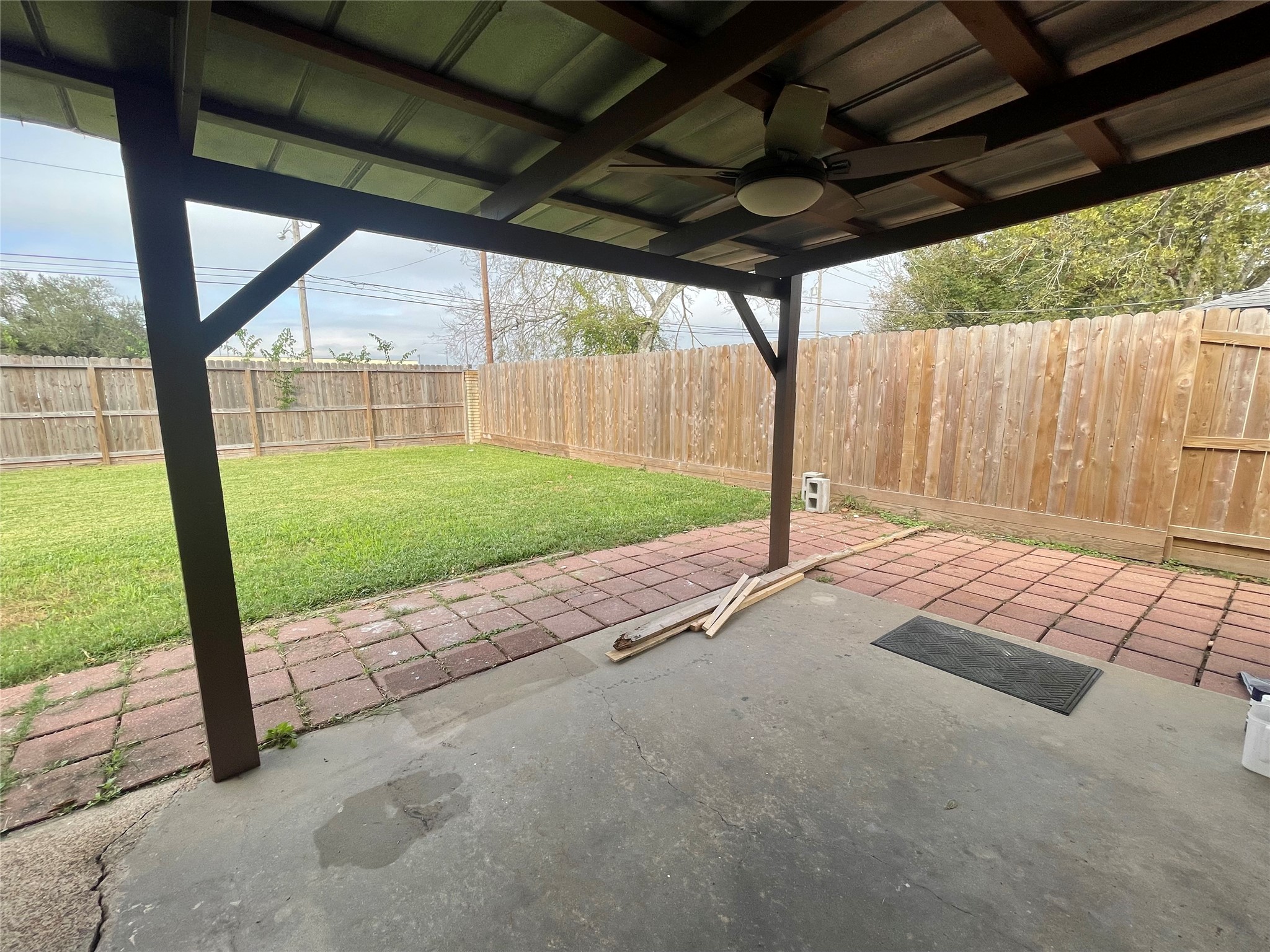 1225 Clover Drive Angleton, TX 77515 - Photo 12 of 15 a view of a porch with a small yard