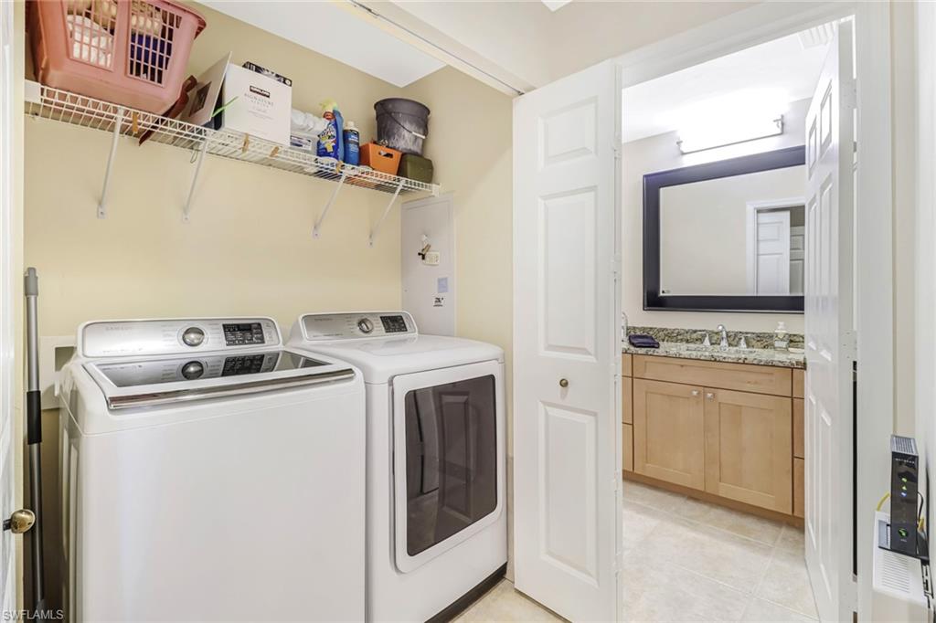 401 Bayfront Place, Unit 3205 Naples, FL 34102 - Photo 22 of 35 a utility room with dryer and washer
