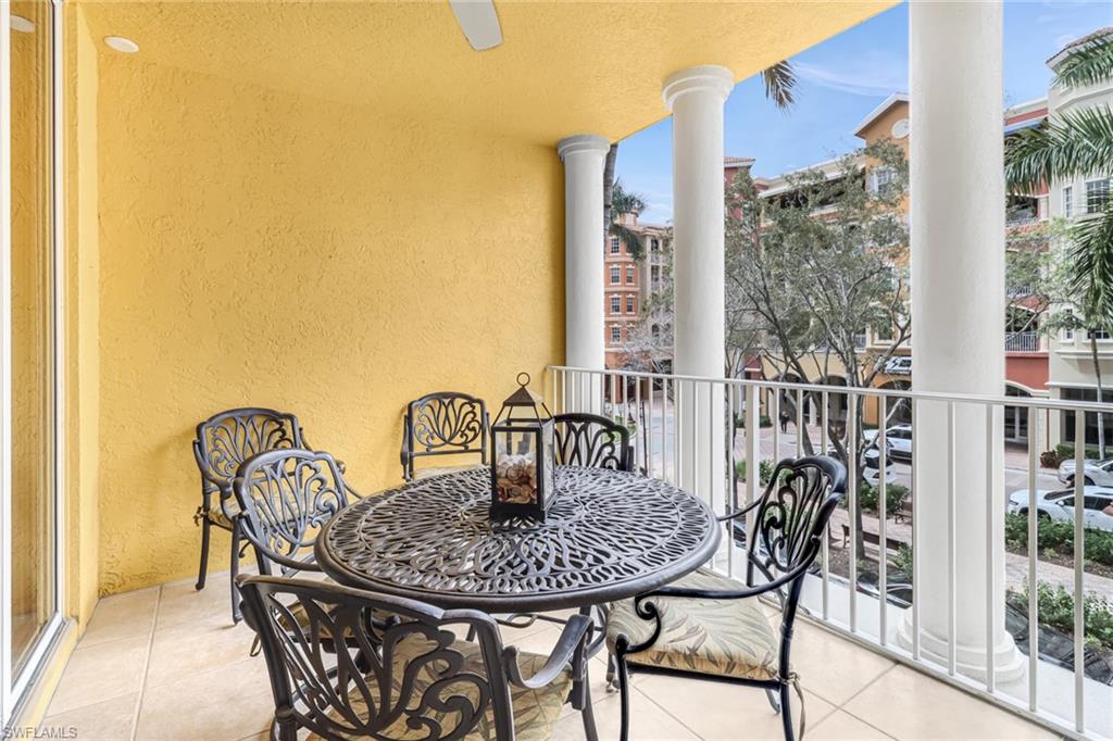 401 Bayfront Place, Unit 3205 Naples, FL 34102 - Photo 24 of 35 a view of a balcony with table and chairs