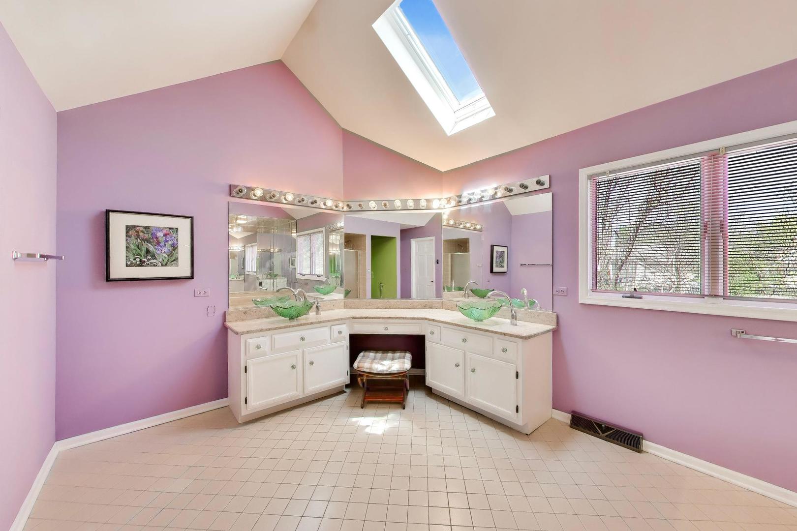 766 Camelot Drive Burr Ridge, IL 60527 - Photo 21 of 48 a spacious bedroom with a bed and a window