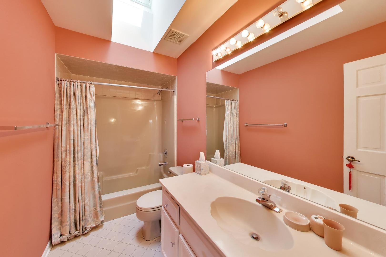 766 Camelot Drive Burr Ridge, IL 60527 - Photo 32 of 48 a bathroom with a sink a toilet and shower