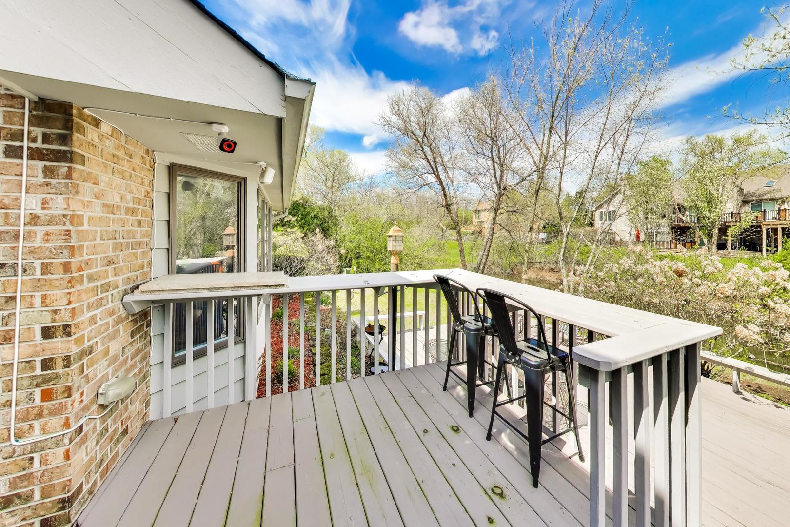 766 Camelot Drive Burr Ridge, IL 60527 - Photo 41 of 48 a view of balcony with wooden floor and fence