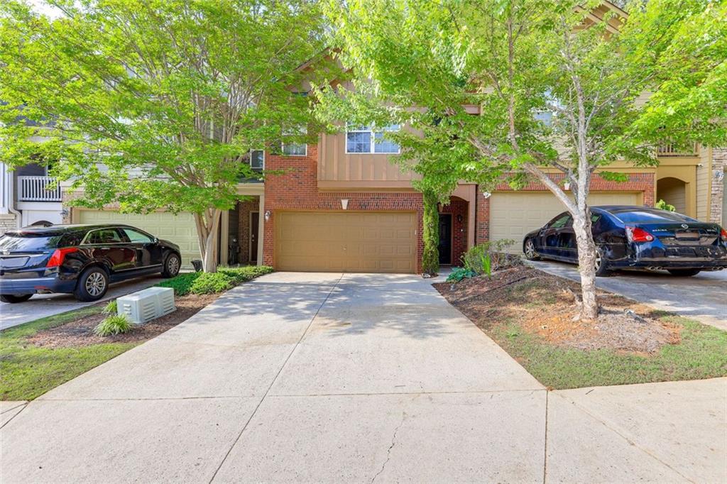 a view of a car parked on the side of a road