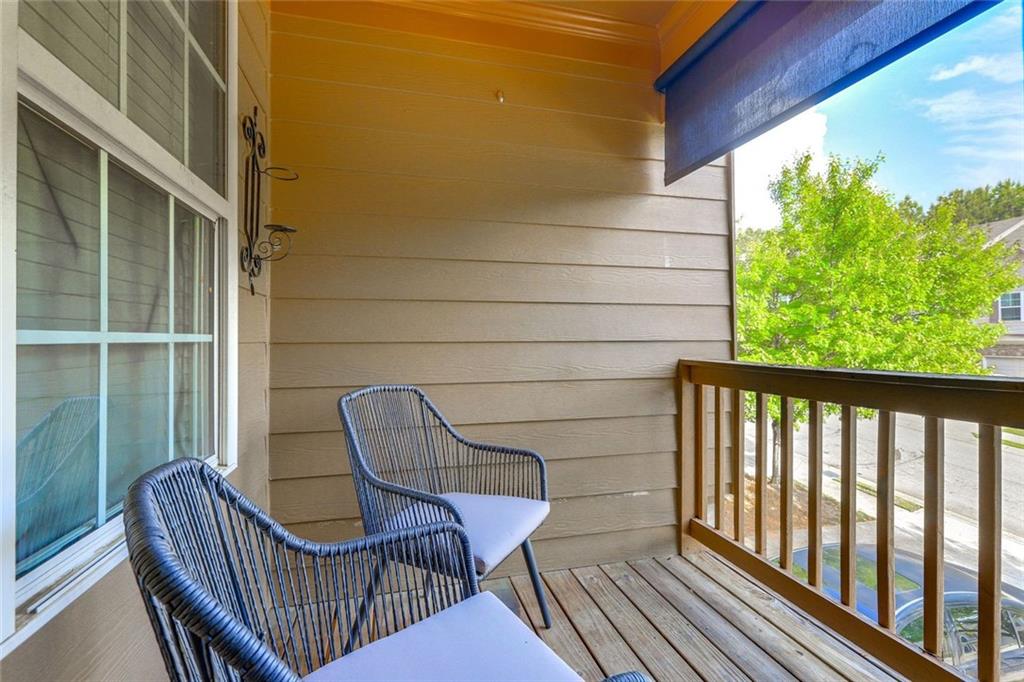 3840 Augustine Place Rex, GA 30273 - Photo 13 of 23 a view of a chair in wooden deck