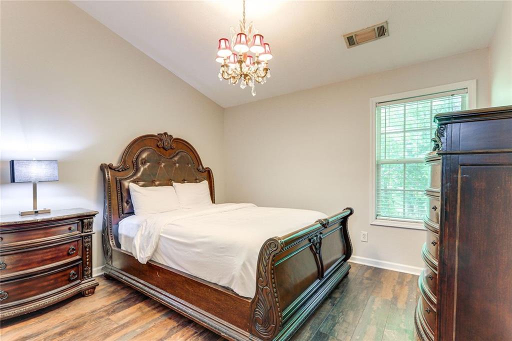 3840 Augustine Place Rex, GA 30273 - Photo 16 of 23 a bedroom with a bed and a window