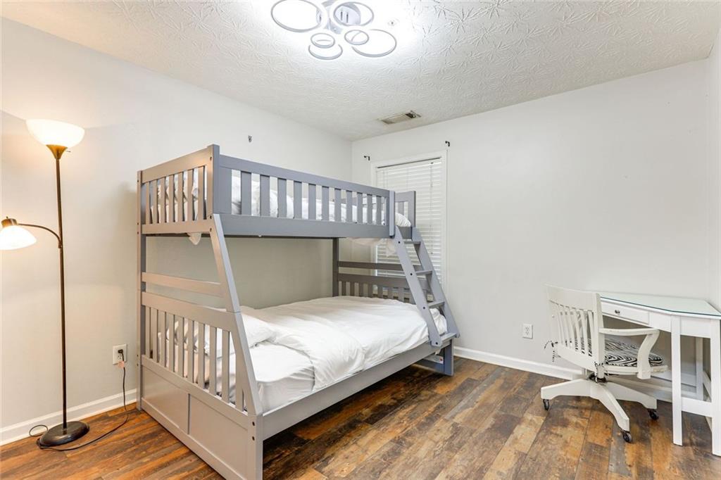 3840 Augustine Place Rex, GA 30273 - Photo 18 of 23 a bedroom with a bed and a window