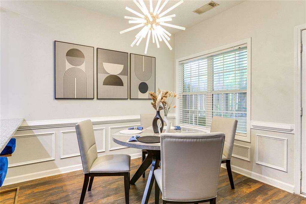 3840 Augustine Place Rex, GA 30273 - Photo 6 of 23 a view of a dining room with furniture window and wooden floor
