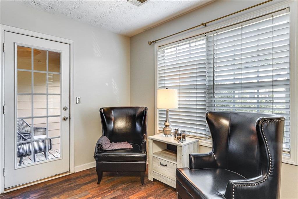 3840 Augustine Place Rex, GA 30273 - Photo 10 of 23 a view of a workspace with furniture and a window
