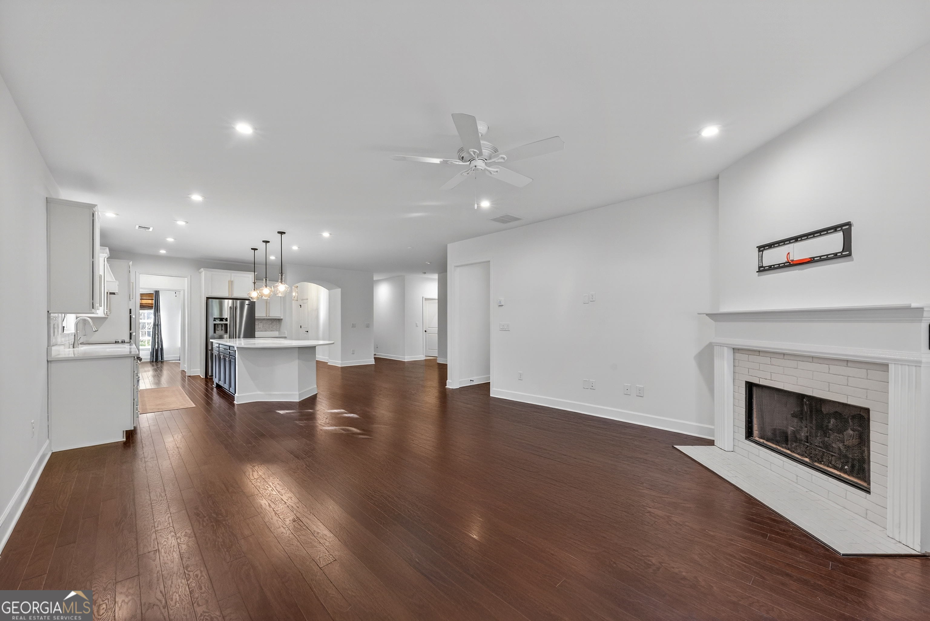 1060 Lone Oak Road Greensboro, GA 30642 - Photo 14 of 26 a view of kitchen with furniture and fireplace