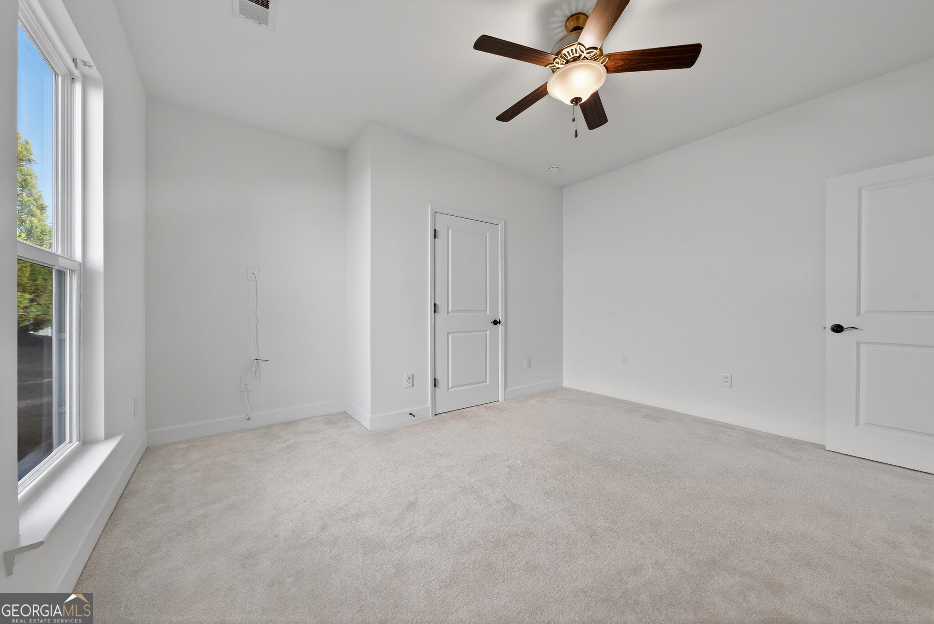 1060 Lone Oak Road Greensboro, GA 30642 - Photo 21 of 26 a view of an empty room with a window