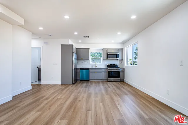 a view of kitchen with wooden floor