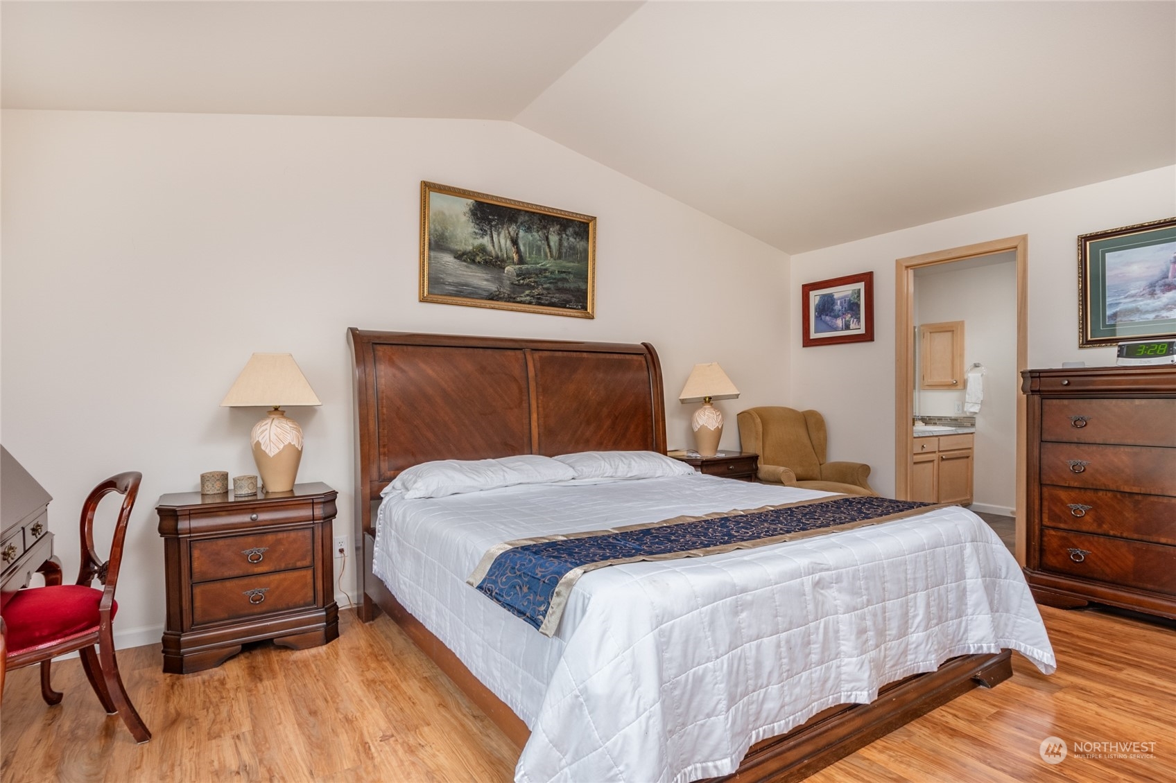 2475 Southwest Talon Loop Oak Harbor, WA 98277 - Photo 15 of 27 a bedroom with a bed table and chair