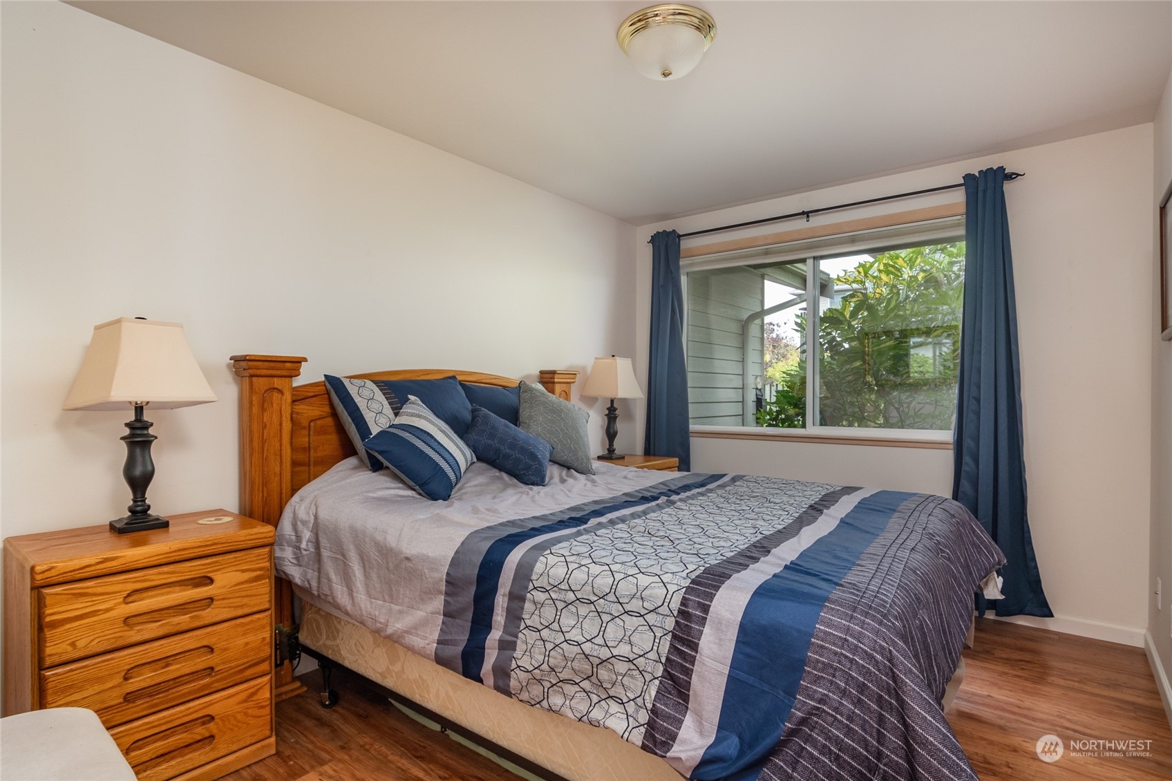 2475 Southwest Talon Loop Oak Harbor, WA 98277 - Photo 18 of 27 a bedroom with bed and window