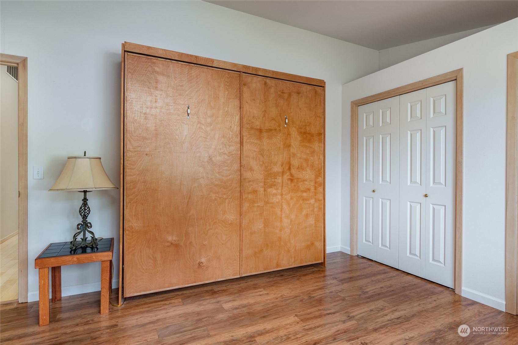 2475 Southwest Talon Loop Oak Harbor, WA 98277 - Photo 20 of 27 a view of an empty room with wooden floor and a window