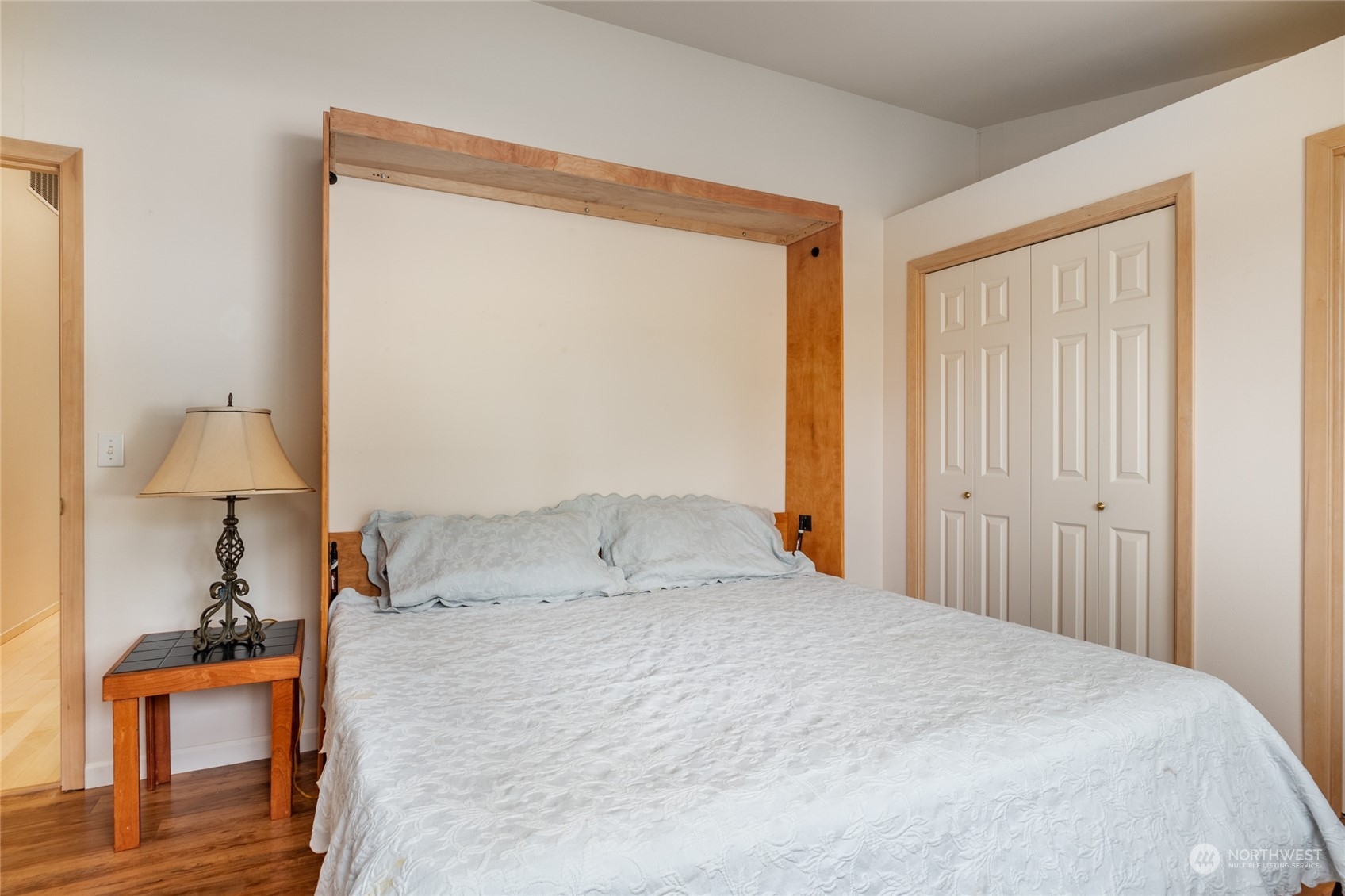 2475 Southwest Talon Loop Oak Harbor, WA 98277 - Photo 21 of 27 a bedroom with a bed and a lamp on table