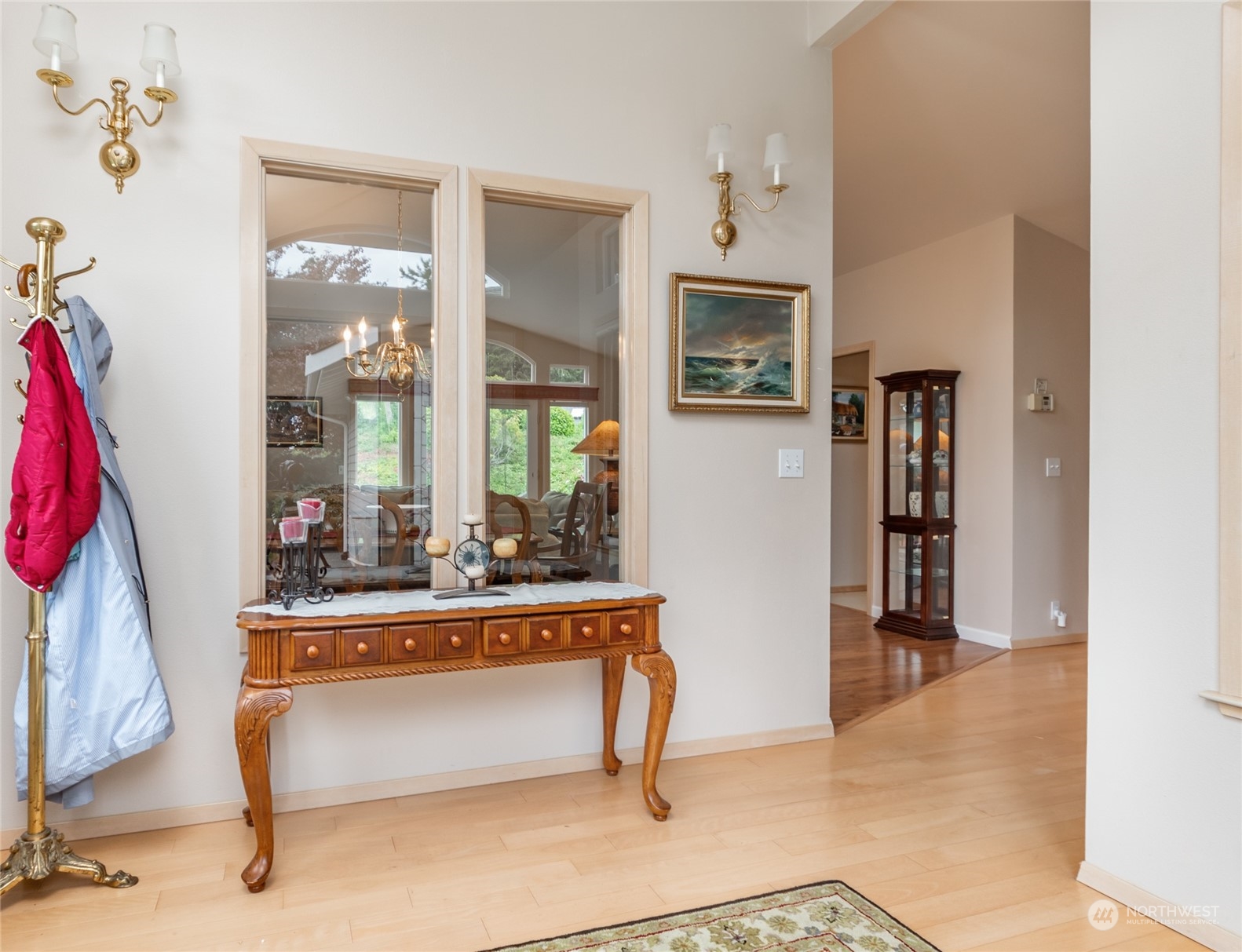 2475 Southwest Talon Loop Oak Harbor, WA 98277 - Photo 4 of 27 a living room with furniture a window and a flat screen tv