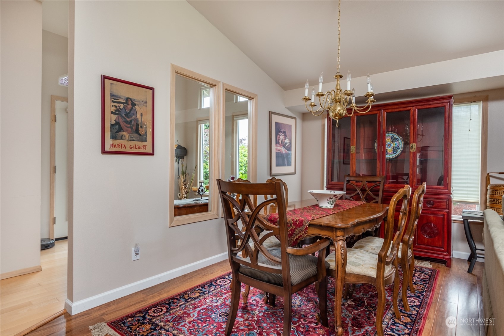 2475 Southwest Talon Loop Oak Harbor, WA 98277 - Photo 10 of 27 a view of a dining room with furniture and chandelier
