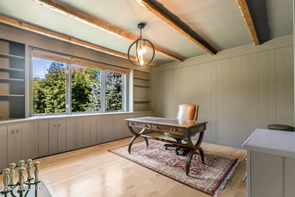 a view of a house with a roof deck