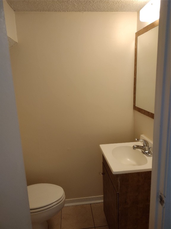 2403 B 1st Avenue Fernandina Beach, FL 32034 - Photo 6 of 17 a bathroom with a sink a toilet and a mirror