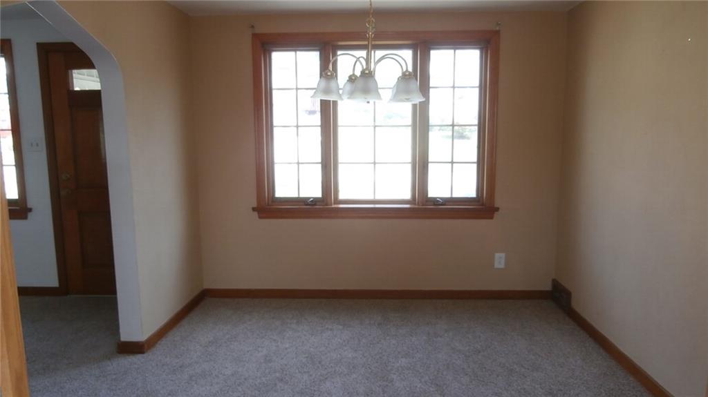 1030 Hastie Road Pittsburgh, PA 15234 - Photo 4 of 19 Light and bright dining room with chandelier, new carpeting and Pella window