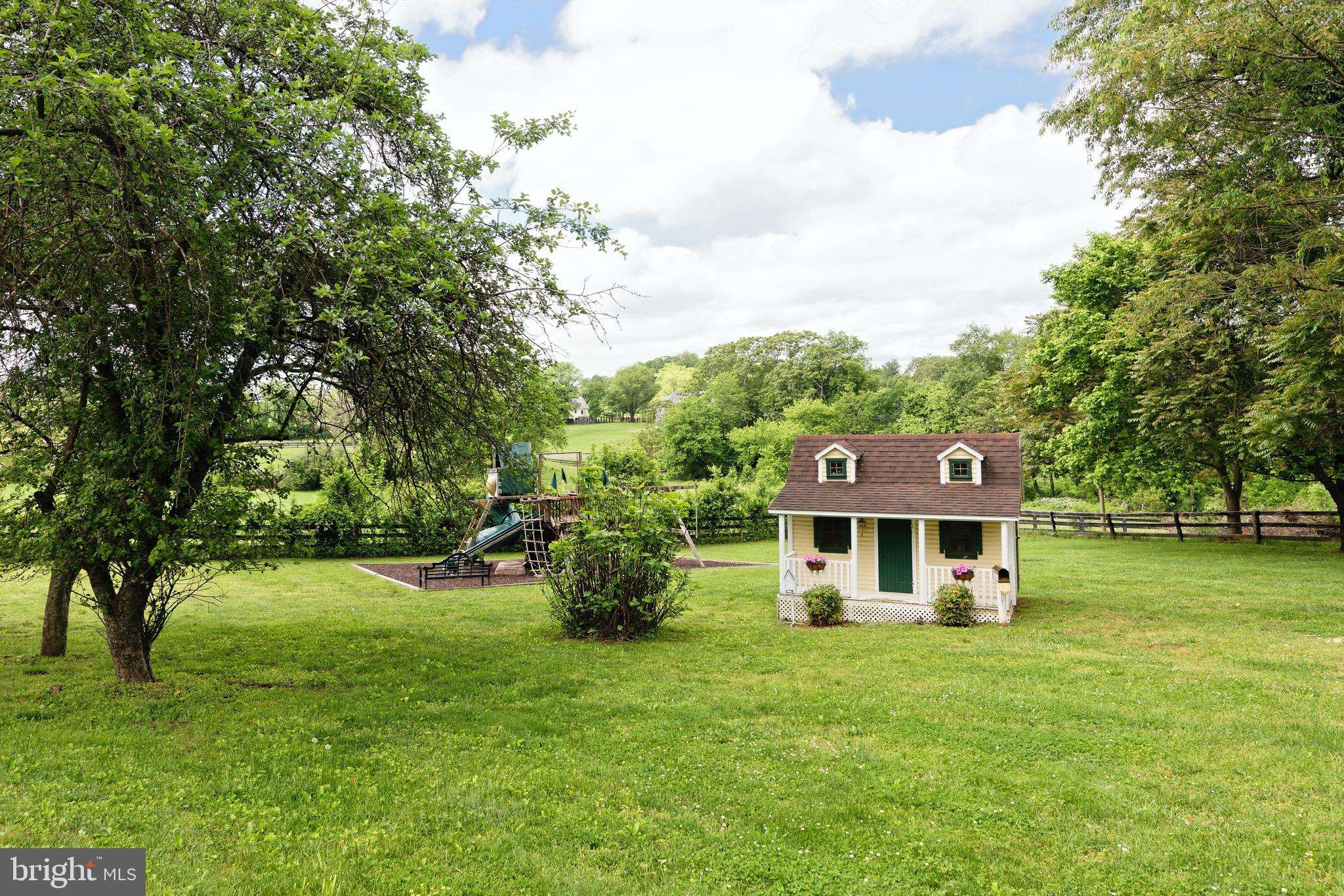 23413 Dover Road Middleburg, VA 20117 - Photo 38 of 73 Open lawn area with play set and playhouse