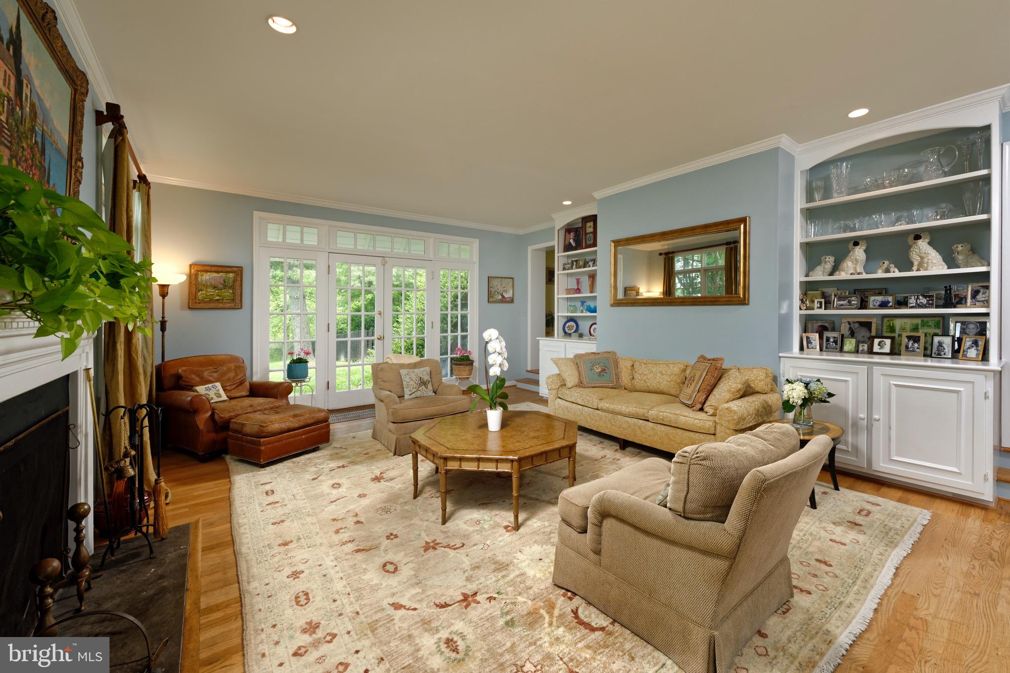 23413 Dover Road Middleburg, VA 20117 - Photo 8 of 73 Built-ins and french doors that open to a terrace