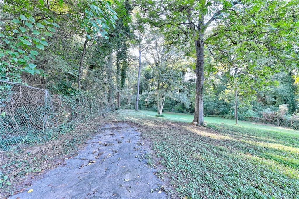 2181 Juanita Street Decatur, GA 30032 - Photo 15 of 15 a view of a forest with trees in the background