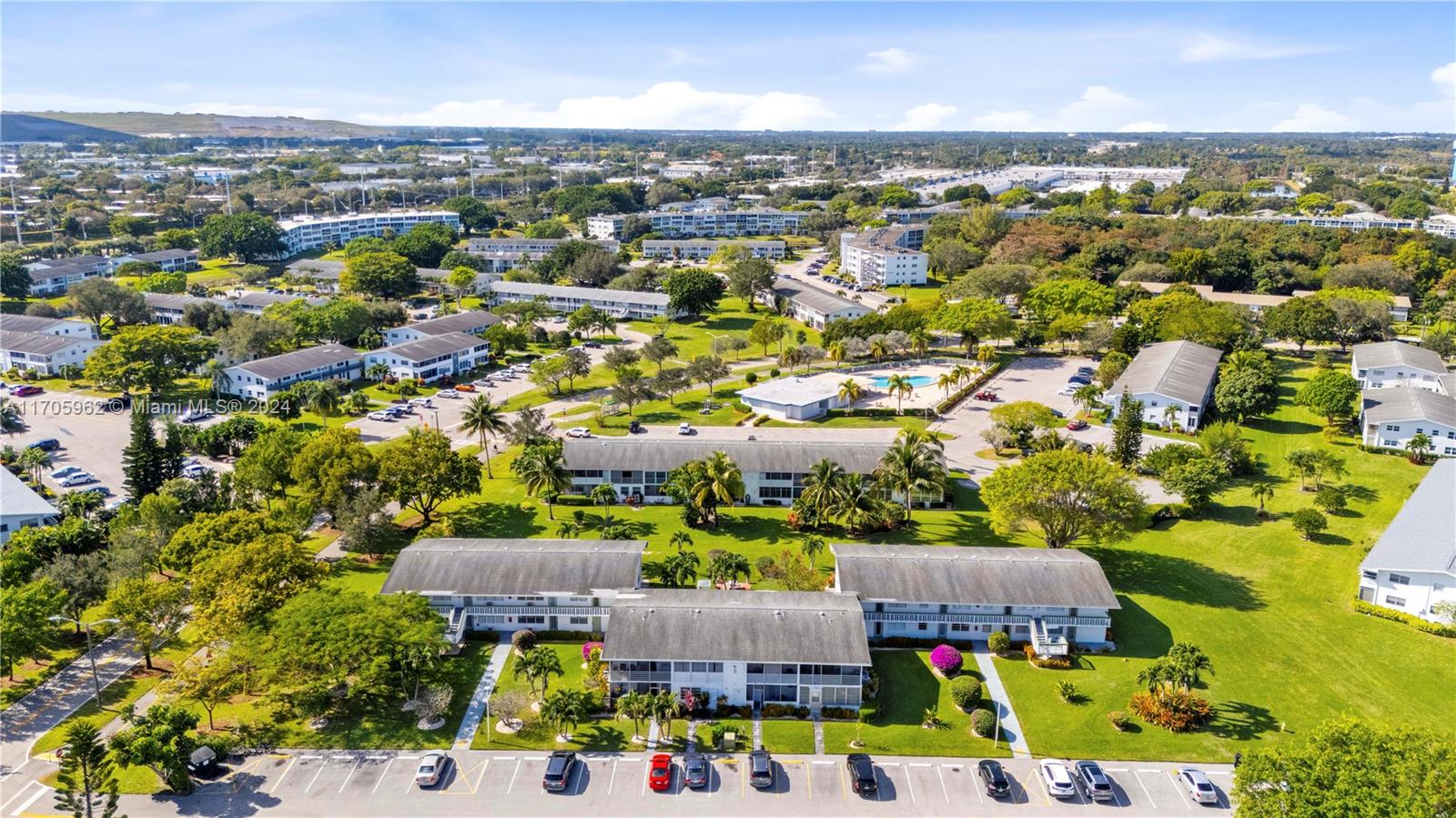 382 Markham R, Unit 382 Deerfield Beach, FL 33442 - Photo 10 of 30 an aerial view of residential houses with outdoor space