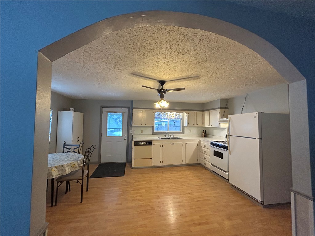 9580 Lodi Center Road Lodi, NY 14860 - Photo 4 of 14 Pretty archway between kitchen & living room.