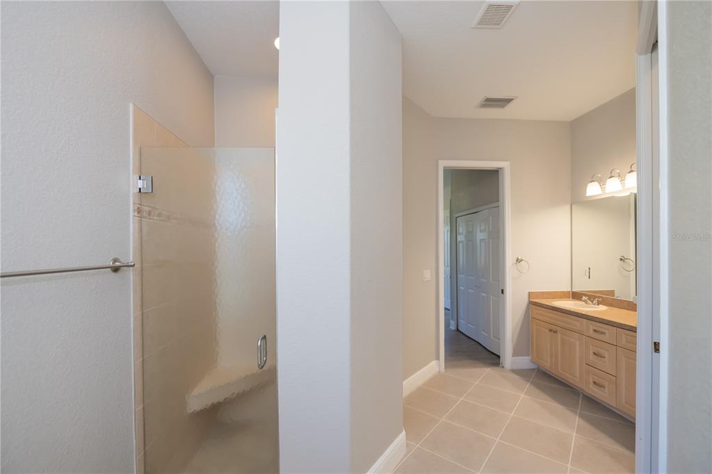 3284 Newmark Street North Port, FL 34291 - Photo 29 of 44 a bathroom with a tub shower and sink