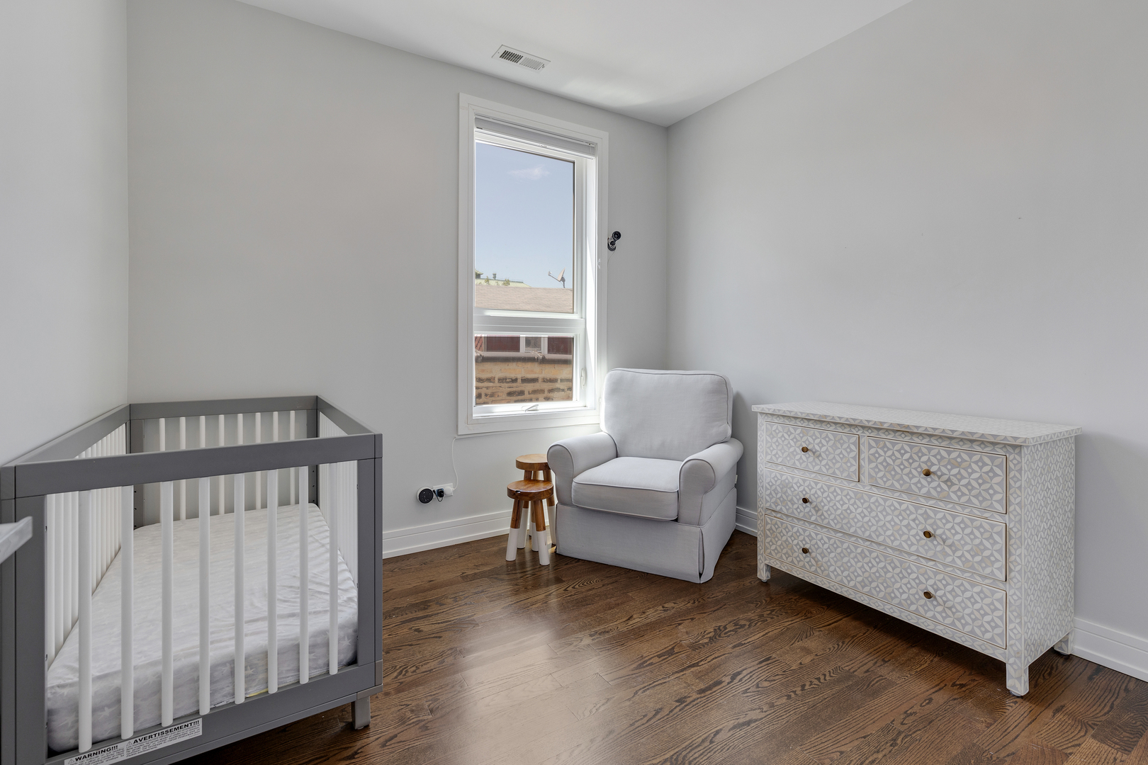 1820 West Haddon Avenue, Unit 2 Chicago, IL 60622 - Photo 11 of 18 a living room with furniture and a window