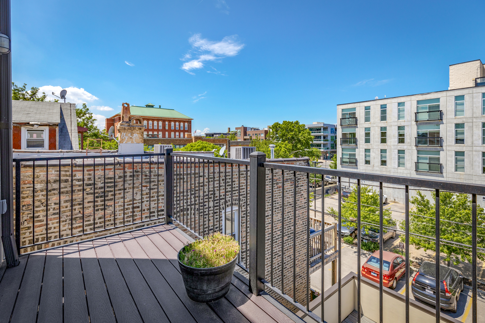 1820 West Haddon Avenue, Unit 2 Chicago, IL 60622 - Photo 16 of 18 a view of a balcony with wooden floor