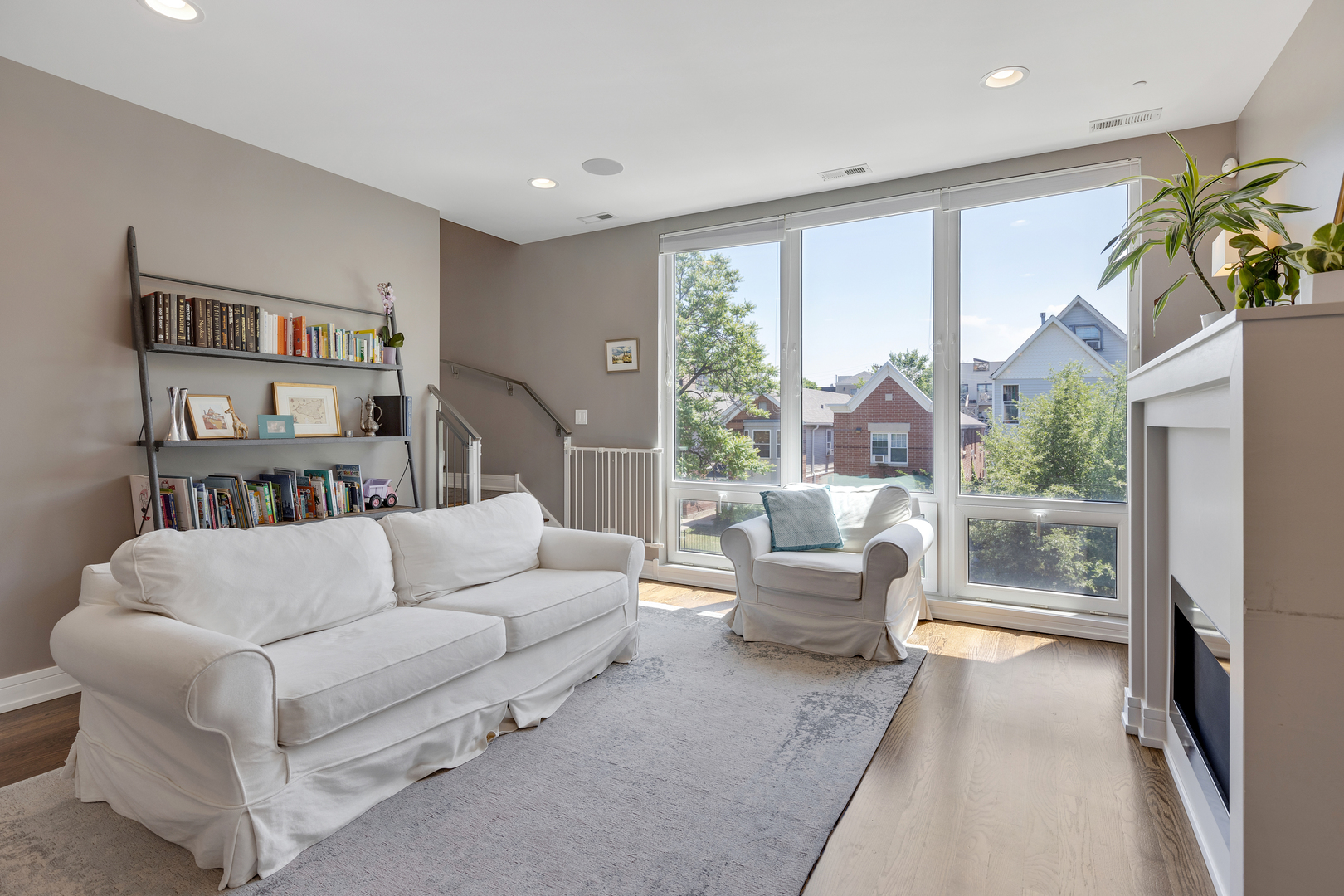 1820 West Haddon Avenue, Unit 2 Chicago, IL 60622 - Photo 5 of 18 a living room with furniture and a large window