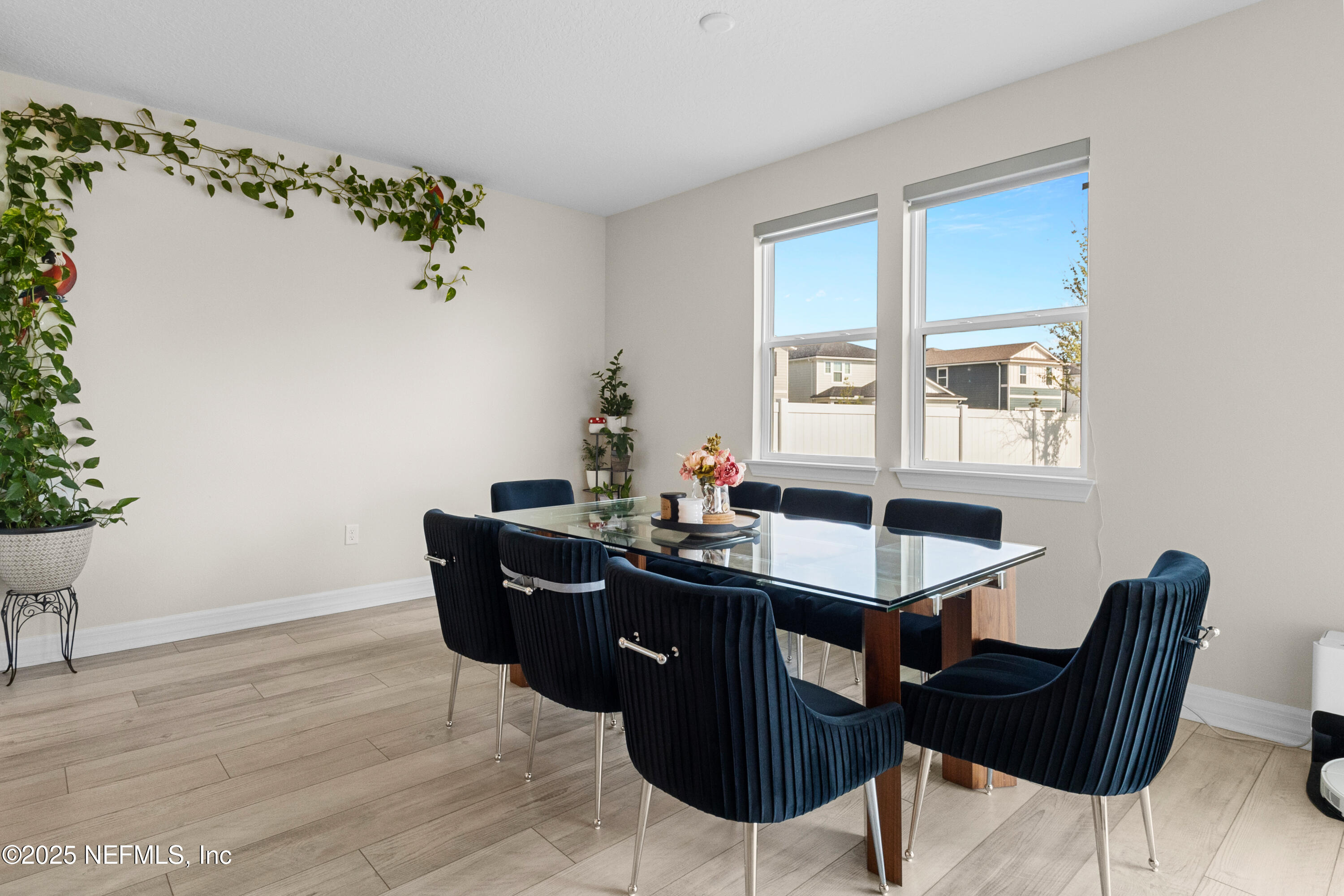 27 Flintlock Ln Street St. Augustine, FL 32095 - Photo 13 of 65 a view of a dining room with furniture window and wooden floor