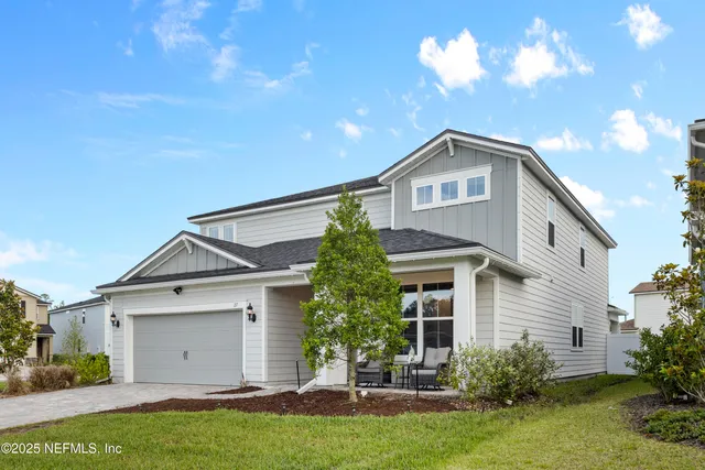 a workspace with furniture and a window
