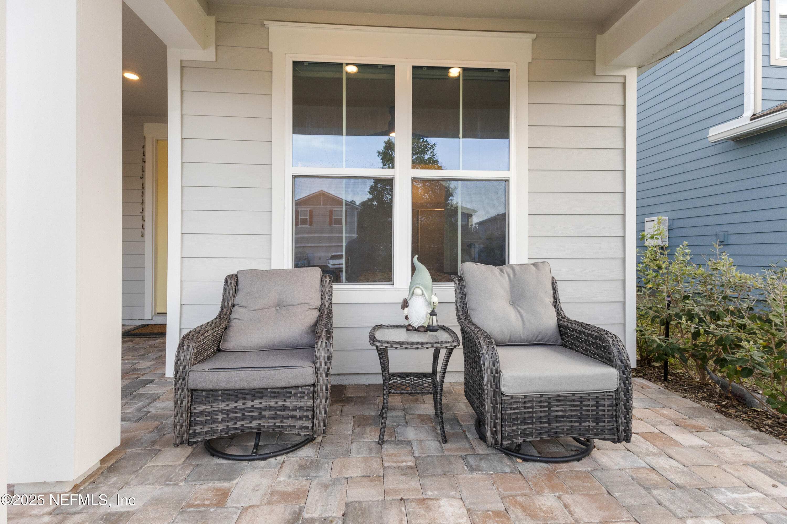 27 Flintlock Ln Street St. Augustine, FL 32095 - Photo 21 of 65 a view of a patio with couple of chairs