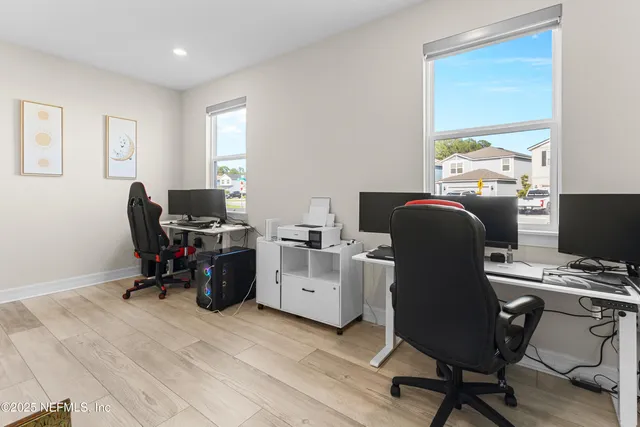 an aerial view of a house with a garden