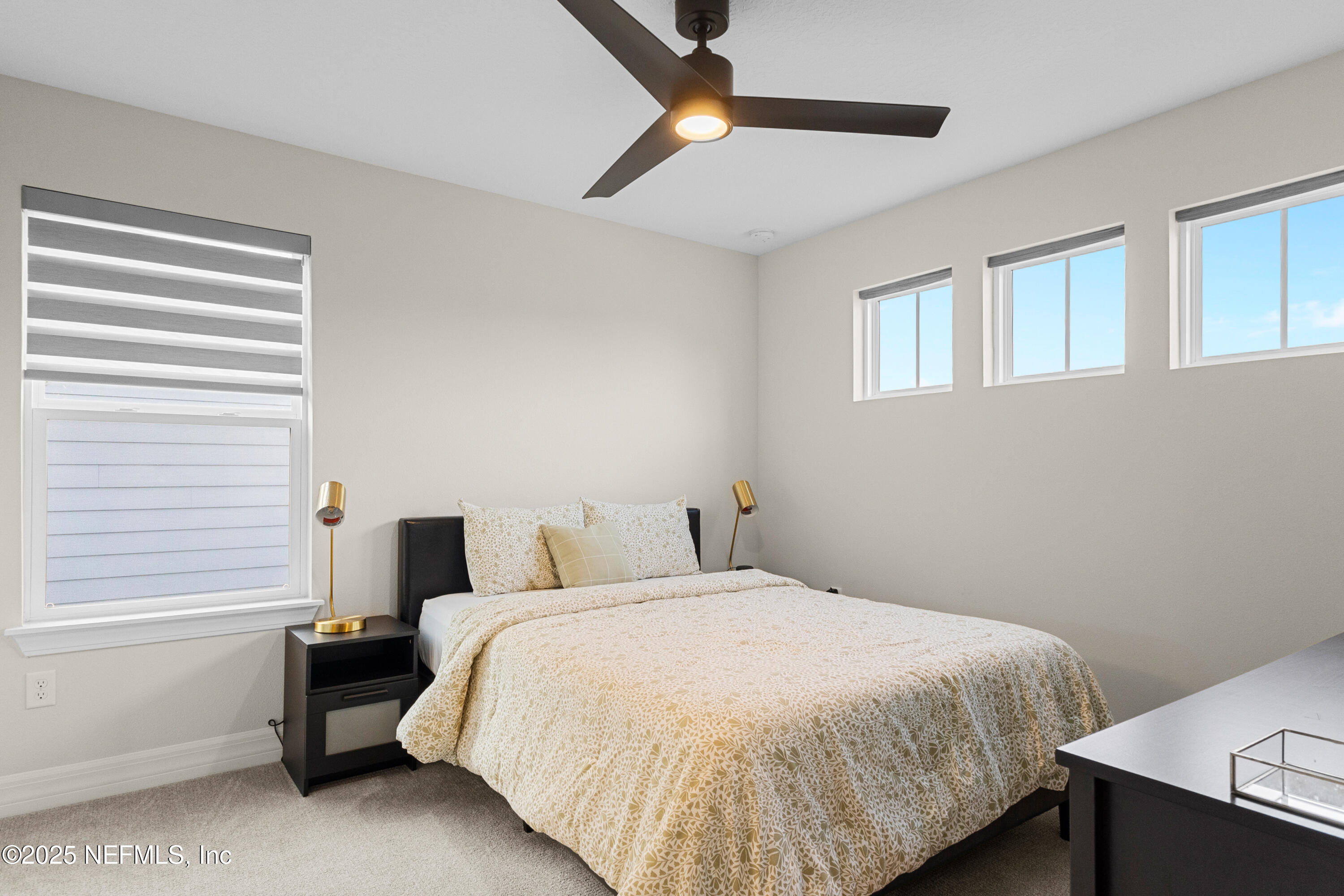 27 Flintlock Ln Street St. Augustine, FL 32095 - Photo 48 of 65 a bedroom with a bed and a window