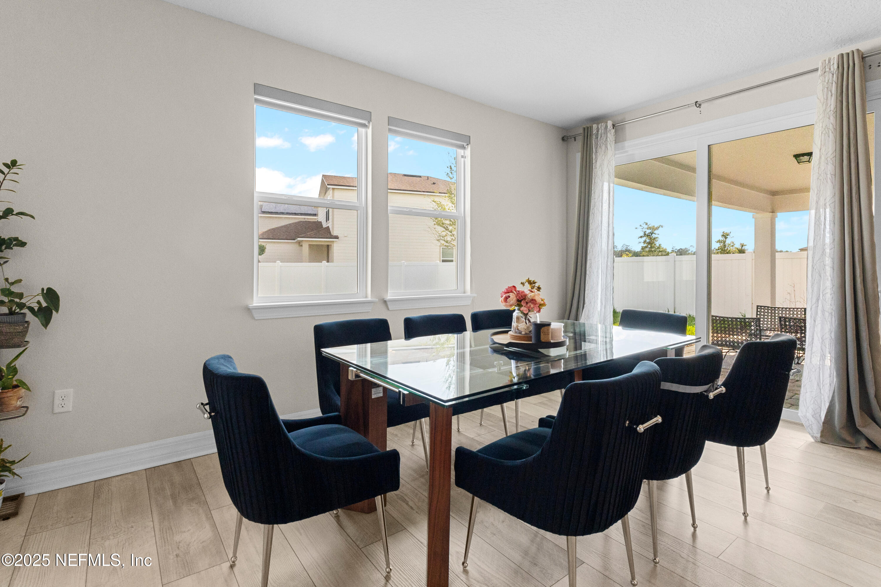 27 Flintlock Ln Street St. Augustine, FL 32095 - Photo 5 of 65 a view of a dining room with a table and chairs