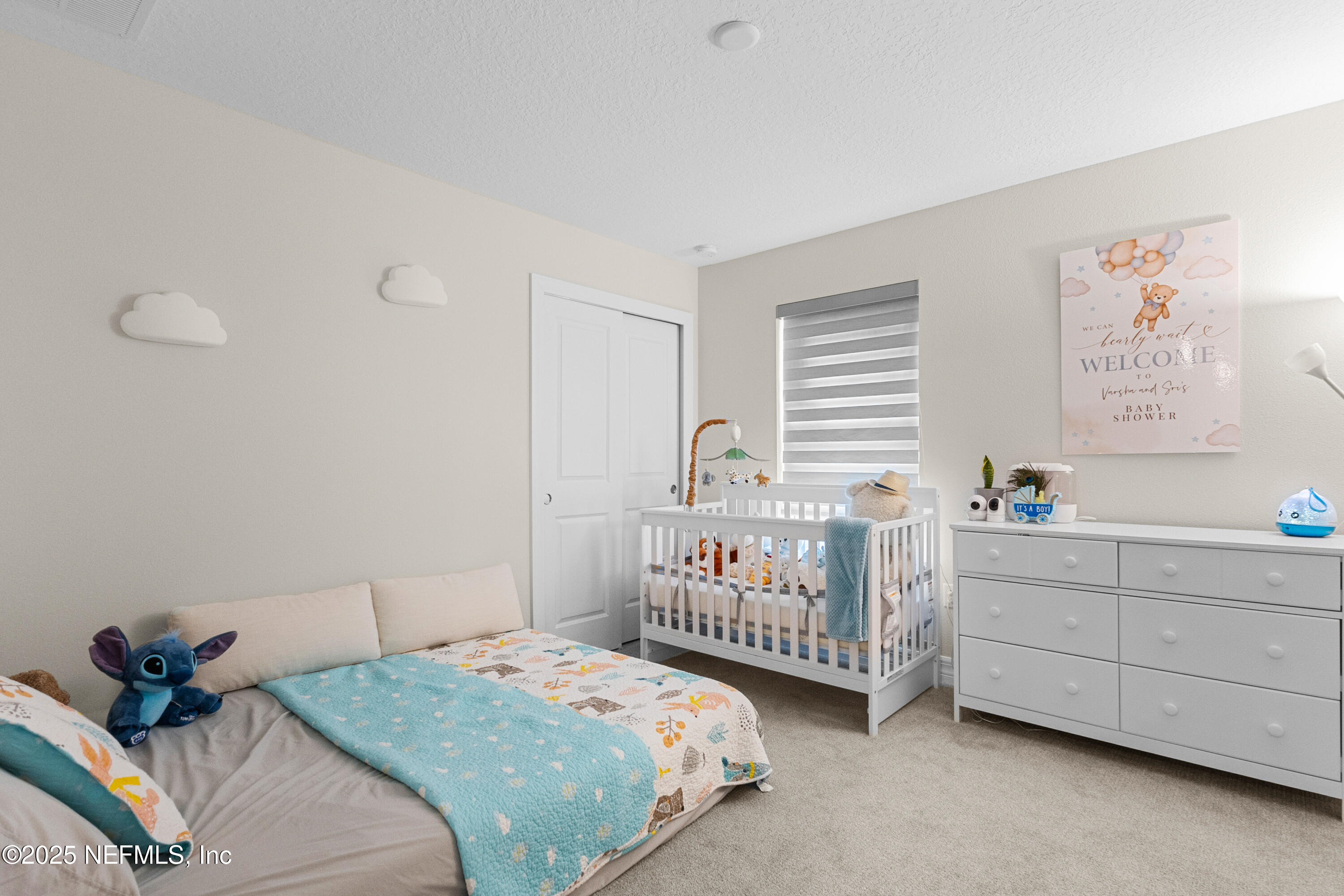 27 Flintlock Ln Street St. Augustine, FL 32095 - Photo 56 of 65 a bedroom with a bed and a window