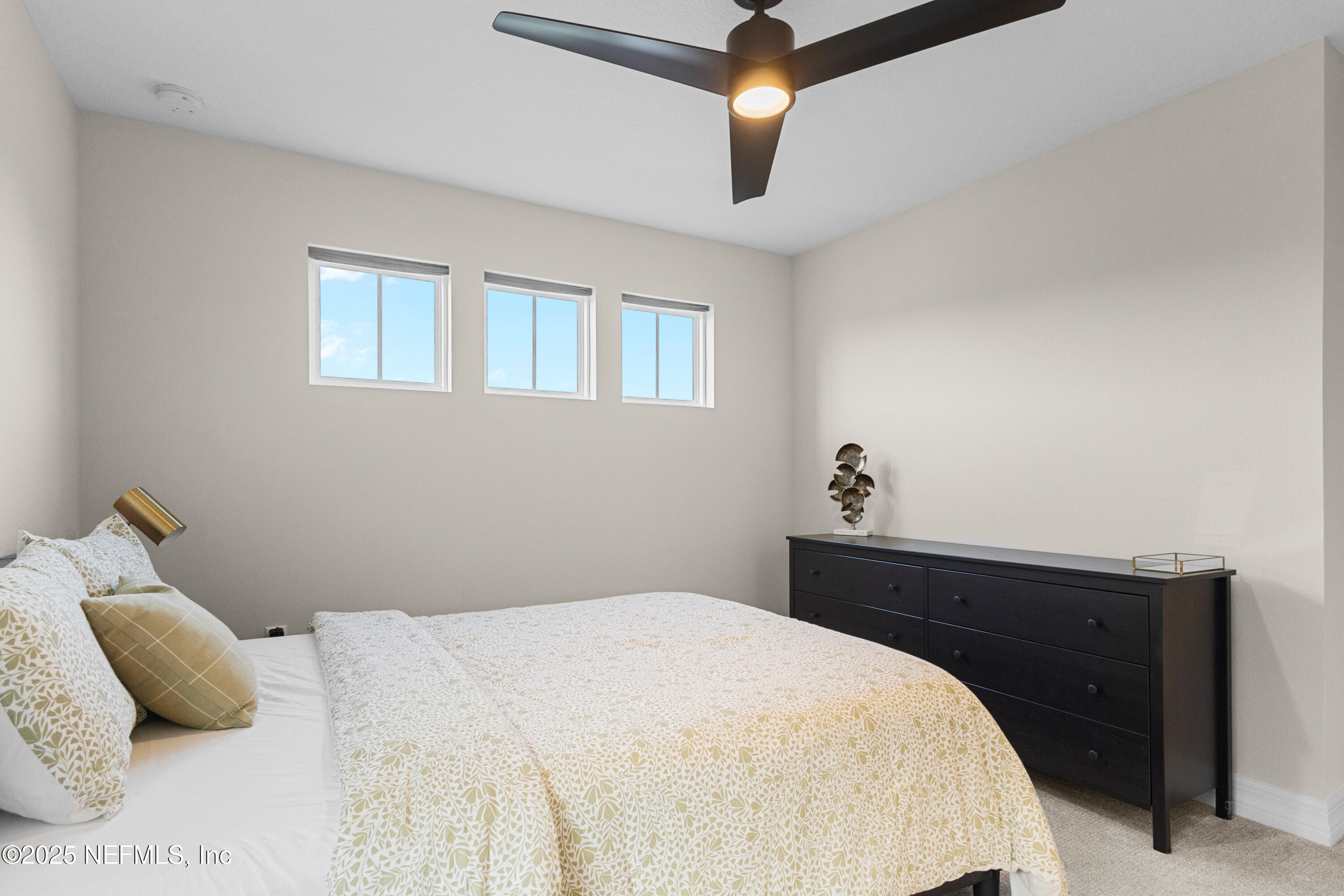 27 Flintlock Ln Street St. Augustine, FL 32095 - Photo 59 of 65 a bedroom with a bed and window