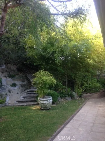 a garden view with a sitting space