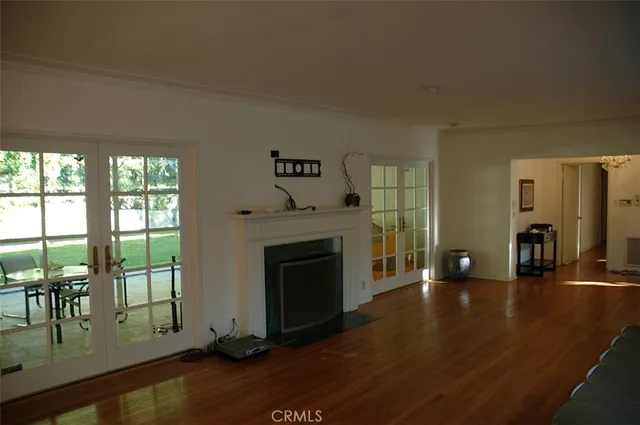 a view of a livingroom with furniture and a fireplace