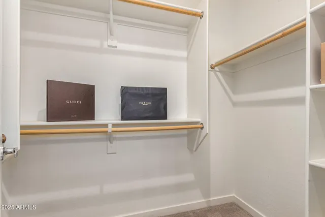 a view of an empty walk in closet