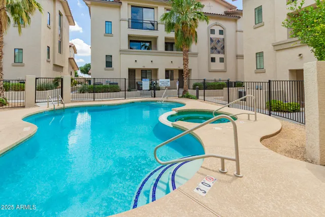a view of storage and utility room with washer and dryer